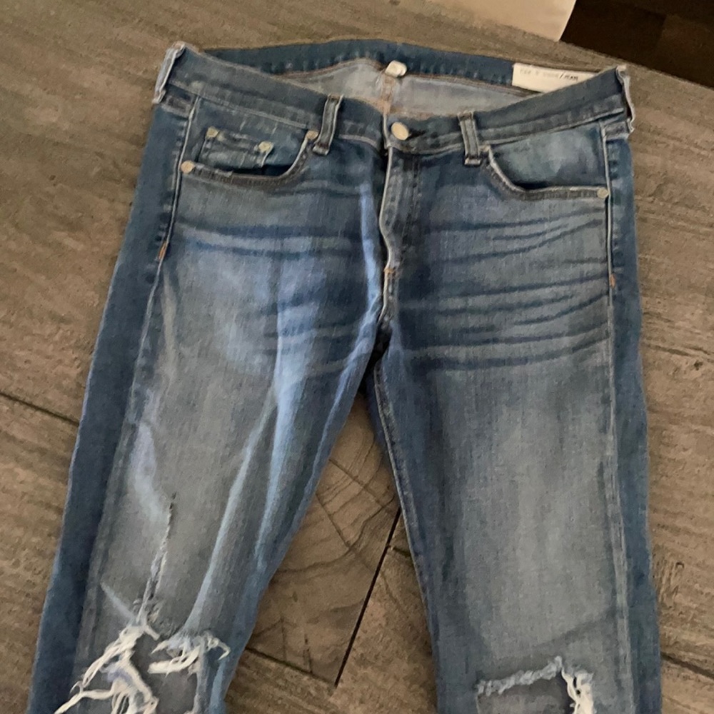Rag & Bone distressed knee skinny jeans.
